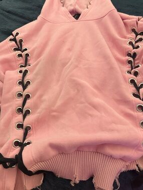 Dolls Kill Pink Hoodie with Black Lace-Up Detail distressed look